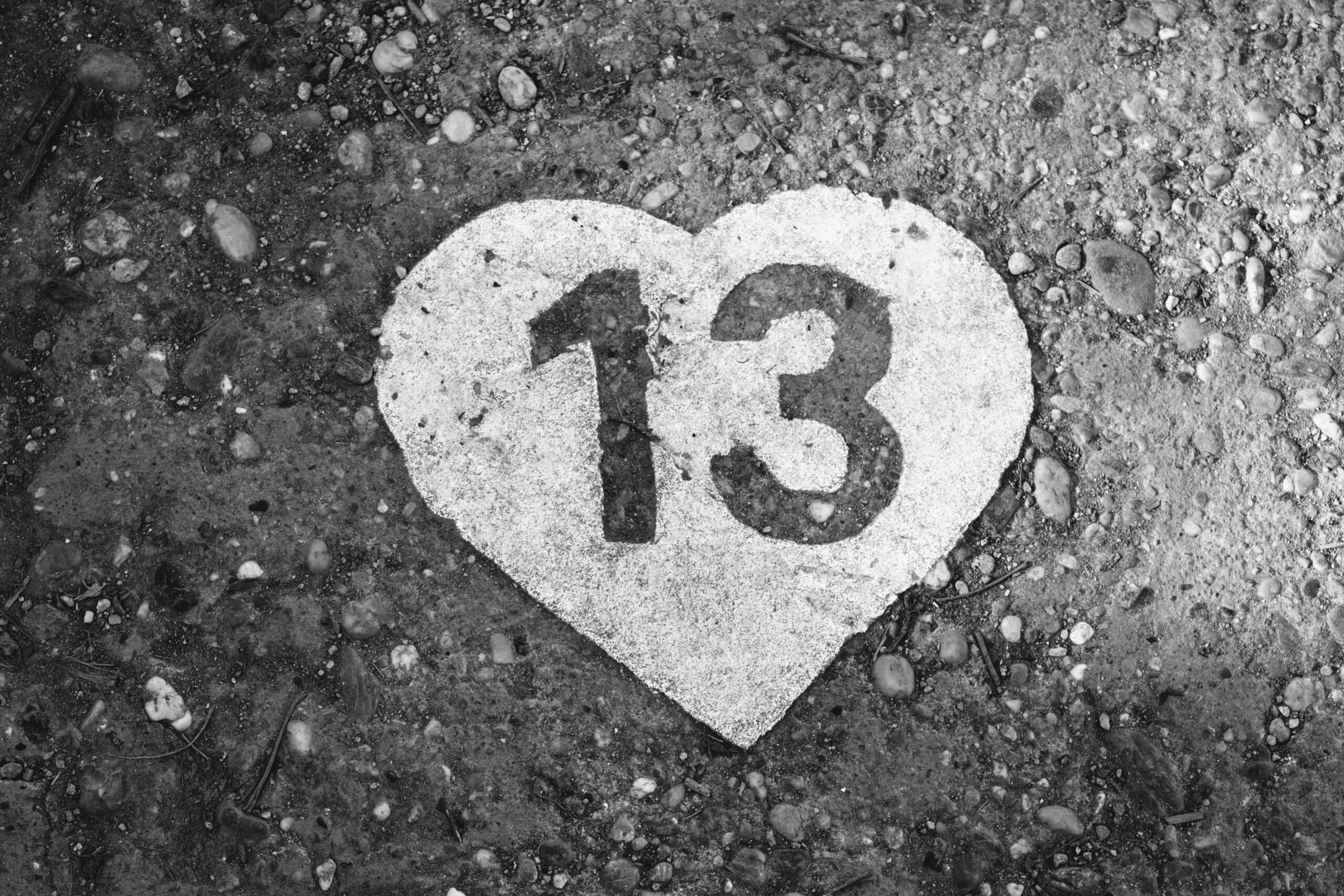 My official plea for a Taylor Swift Book - the number 13 in a heart on the sidewalk